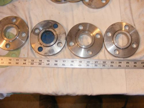 Lot of 4 1 1/4" 304L Stainless Steel four bolt flanges Asa 182 150 psig Flanges