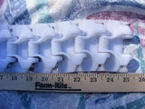 7' of UNI White Plastic Conveyor Chain 3 1/4" wide each tab 2" long Pinned